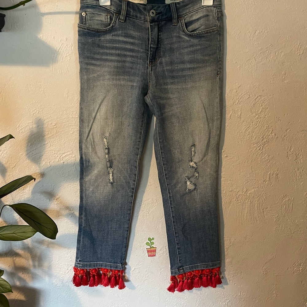Pilcro And The Letter Press jeans with tassels on the bottom